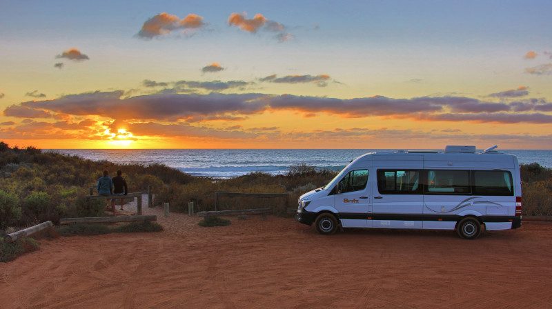 Britz AU Venturer-WA-Sunset Couple-Exterior-Scenic-Filip Kulise