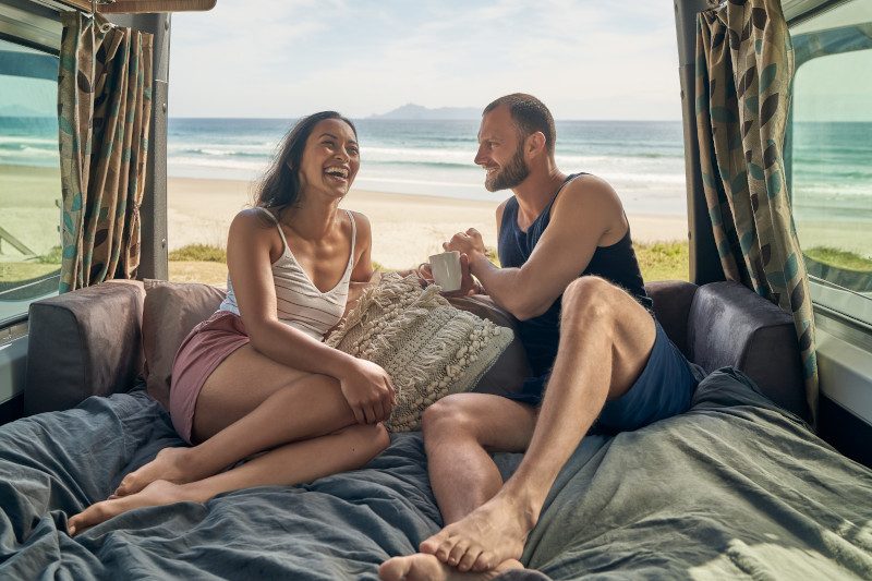 Couple-relaxing-on-bed